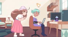 two people in a room with a laptop