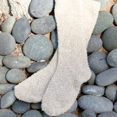 The Barefoot Dreams Cozychic Women's Heathered Socks are the ultimate in comfort. Slip on these lush, heathered socks and go off to dreamland, or simply wear them around the house for a cozy feel. Super soft Heathered 97% Polyester/3% Spandex Various colors Size: One SizeCare: Machine wash cold. Gentle cycle. Do not bleach. Tumble dry low. WE DO NOT RECOMMEND THE USE OF FABRIC SOFTENERS. THEY CAN ALTER THE LOOK AND FEEL OF OUR FABRIC. One Size Cozy Soft Knit Socks, Cozy Soft Beige Socks, Snug Beige Soft Socks, Snug Soft Beige Socks, Soft Snug Beige Socks, Comfortable Beige Mid-calf Socks, Warm Comfortable Socks One Size, Warm Comfortable One Size Socks, Comfortable Warm Socks, One Size