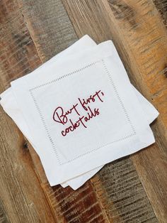 two napkins that have been embroidered onto each other