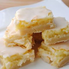 several pieces of cake sitting on top of a white plate