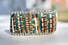 a stack of bracelets sitting on top of a table