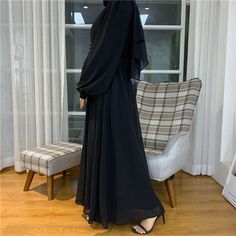 This is a beautifully pleated maxi dress made of fully lined chiffon. Buttons Dress Turkey Button Modest Abaya. Available in 5 beautiful colours. Black Dress Classy, Modest Abaya, Prom Couples, Black Dresses Classy, Dress Classy, Pleated Chiffon, Business Tops, Pleated Maxi Dress, Pleated Maxi