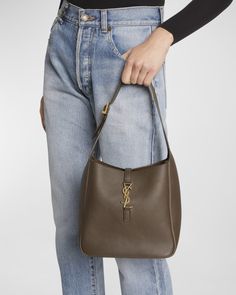 Saint Laurent "Le 5 À 7" hobo bag in leather    Adjustable buckle shoulder strap Golden hardware   Open top with YSL center strap   Approx. 6.7"H x 10.2"W x 4.3"D   Made in Italy Saint Laurent Le 5 A 7, Ysl Hobo Bag, Ysl Hobo, Ysl Purse, Ysl Bags, Anthony Vaccarello, Pony Hair, Branded Bags, Open Top