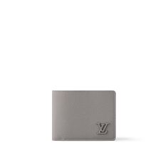 LOUIS VUITTON® - Multiple Wallet - Gris Brume Louis Vuitton Men’s Wallet, Luxury Wallets With Engraved Logo For Everyday Use, Luxury Wallets With Engraved Logo, Designer Tan Wallet For Evening, Luxury Bifold Wallet With Embossed Logo, Designer Tan Bifold Wallet, Louis Vuitton Official Website, Men Wallet, Trunk Bag