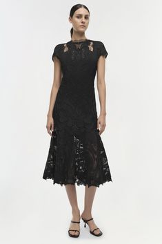 CORE COLLECTION Our Signature Laura Lace Appliqué Midi Dress in Black. Romantic and feminine, this cap sleeve midi dress is cut from delicate lace for a fluid silhouette. Framing the tiered skirt and v-neck back, subtle eyelet embroidery adds a final decorative flourish. A Simkhai signature. Also available in: White Burgundy Lace Dress, Cutwork Dress, Lace Burgundy Dress, Black Lace Midi Dress, Eyelet Embroidery, Burgundy Lace, All Black Everything, Pattern Ideas, Lace Dress Black