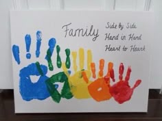 a family hand print is displayed on a card