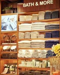 a store display filled with lots of folded towels