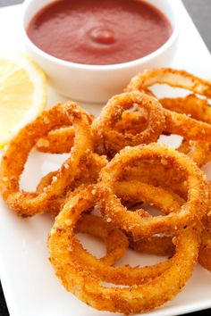 onion rings with dipping sauce on the side