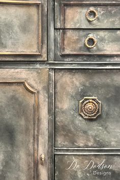 an old metal cabinet with three drawers