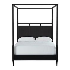 a bed with a black frame and white sheets on it's headboard, in front of a white background