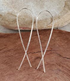 Sleek elegant sterling silver arc earrings Elegant Wrap Earrings With Ear Wire, Elegant Hoop Wrap Earrings For Gift, Elegant Adjustable Small Hoop Wrap Earrings, Dainty Silver Drop Wrap Earrings, Elegant Small Hoop Wrap Earrings Hypoallergenic, Elegant Hypoallergenic Small Hoop Wrap Earrings, Elegant Adjustable Hypoallergenic Hoop Earrings, Metal Long Drop Threader Earrings, Adjustable Linear Elegant Earrings