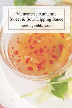 vietnamese authentic sweet and sour dipping sauce on a white plate with garnishes