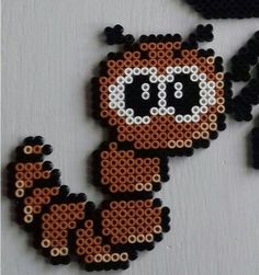 an image of a pixel art piece made out of beads