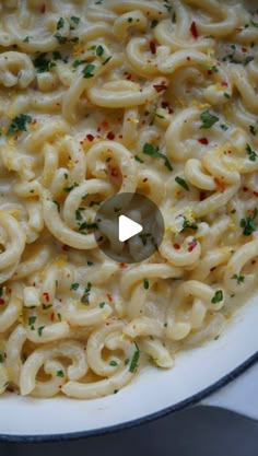 macaroni and cheese is being cooked in a skillet