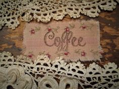 an old doily with the word coffee on it