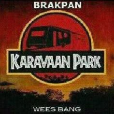 the karavan park logo is shown in red and black, with an orange sky behind it