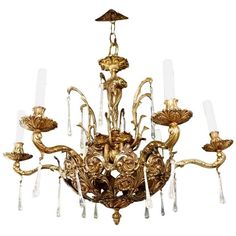 an antique chandelier with many lights on it