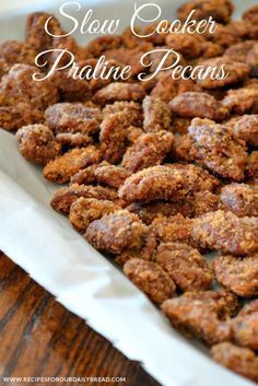 some food is sitting on a table with the words slow cooker prathe pecans