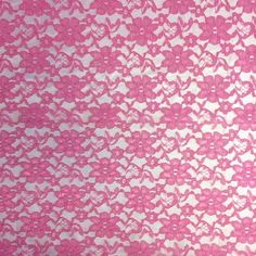 pink and white lacy fabric with small flowers on it