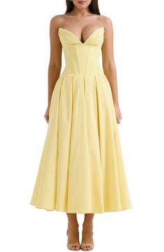 A buttery yellow gown is designed with the brand's signature boned bodice, a swishy, tulle-lined skirt and the perfection of a pair of discreet pockets. Exclusive retailer Hidden back-zip closure Strapless Plunge neck Side-seam pockets Lined 65% viscose, 35% polyester Dry clean Imported Yellow Rehearsal Dinner Dress, Yellow Corset Prom Dress, Fitted Yellow Dress With Pleated Bodice, Yellow Fitted Dress With Pleated Bodice, Yellow Wedding Guest Dress, Yellow Strapless Dress, Corset Gown, 2024 Wishlist, Yellow Gown