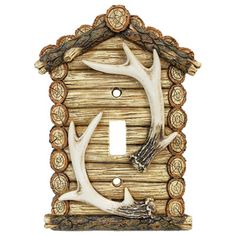 a light switch cover with deer antlers on it