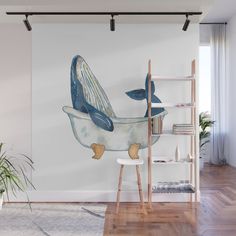 a bathroom wall mural with a blue whale in a bathtub on the wall next to a plant