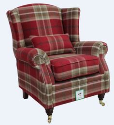 a red plaid chair sitting on top of a white floor