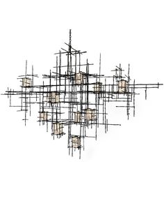 a sculpture made out of wires and cubes on a white background with one light in the middle