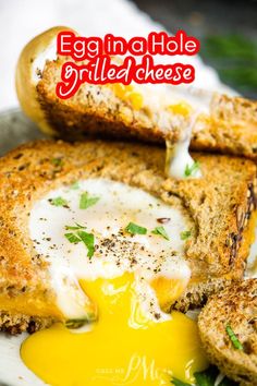 egg in a hole grilled cheese sandwich on a plate