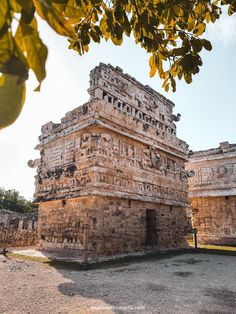 an ancient building with writing on it