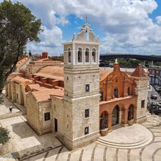 an aerial view of a building with a clock tower