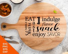 a wooden cutting board with the words eat, indulge and flavor snack enjoy savor on it