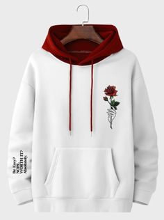 a white hoodie with a red rose embroidered on it