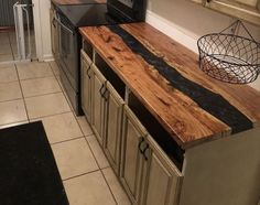 a kitchen counter made out of wood and metal