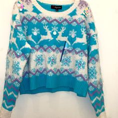 Woman’s Teal And White Fair Isle Christmas Sweater In Excellent New Condition Long Sleeves Teal And White Sweater Printed Winter Scene Reindeer Sequins For Snow Snowflake Designs Super Soft Textured Fluffy Pine Valley Box Jja Acrylic And Polyester Fair Isle Winter Reindeer Snowflakes Sequins Texture Fluffy Fuzzy Ugly Christmas Sweater Gingerbread Girl Fair Isle Christmas, Winter Reindeer, Pine Valley, Gingerbread Girl, Winter Scene, Snowflake Designs, White Sweater, Winter Scenes, White Sweaters