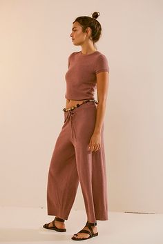 Perfectly paired and seriously soft, this cozy set from our free-est collection is effortless for lounging, layering, and everything in between. **Fit:** Top: Relaxed, baby fit silhouette; Pants: Loose, wide-leg silhouette **Features:** Top: Crew neckline, cropped design, soft sweater knit; Pants: Pull-on design, drawstring feature, ankle-length crop **Why We ❤ It:** Beachy with sandals or laid back with sporty sneakers, this pair has endless ways to wear. | Julia Sweater Set by free-est at Free Cute Lounge, Baby Fits, Sporty Sneakers, Pants Loose, Soft Sweater, Sweater Set, Softest Sweater, Knit Pants, Sweater Knit