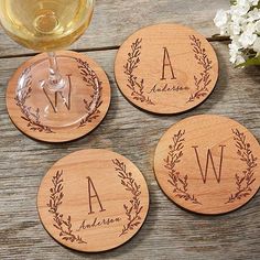 * Custom engraved with their name and initial monogram surrounded by our delicate, rustic laurel wreath design  * Measures 3 7/8 in diameter * Constructed of alderwood * Each coaster has a full cork back to protect your furniture * Individually sold * Made in USA Our exclusive Farmhouse Floral Personalized Wood Coaster will make a lovely accessory to any kitchen or home bar along with their morning coffee or evening cocktail. These wooden coasters make excellent party favors and unique housewarm Wood Etching Ideas, Woodburn Coasters, Wood Burning Coasters Ideas, Honesty Stall, Wood Coaster Ideas, Wood Burning Ideas Gifts, Wood Engraving Ideas, Wood Burning Coasters, Wood Burning Gifts