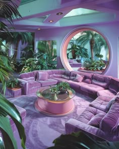 a living room filled with purple couches and plants