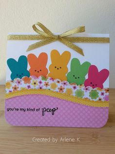 an easter card with three peeps on it