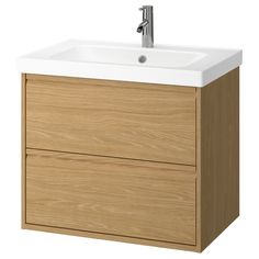 a bathroom sink with a wooden cabinet and faucet on the side, in front of a white background