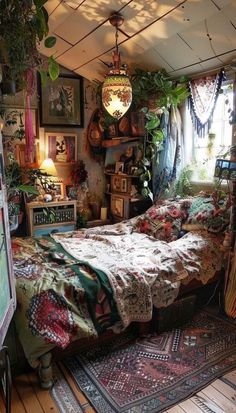 a bed sitting inside of a bedroom on top of a wooden floor next to a window