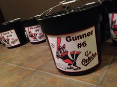 the buckets are lined up on the floor to be used as ice buckets