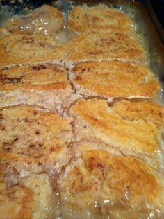 some food is cooking in a pan on top of the stove and it looks like they have been cooked