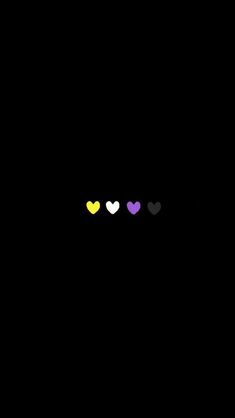 three hearts are in the dark and one is yellow, white, and pink on black