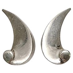 Taxco, Mexico 970 silver Wave Design screwback earrings by Antonio Pineda. These screwback earrings feature renowned master silversmith Antonio Pineda's iconic wave design. Measures approx 1 1/8" high, 1/2" wide at widest point. Weighs 16g, 10.3dwt. Marked Eagle 17 970 Pineda Crown Very nice vintage condition with minor surface scratching and mild tarnish. Item will be packaged securely and shipped with insurance. Wave Design, Screw Back Earrings, Vintage Bracelets, Ruby Lane, Anton, Ring Holder, Gold And Silver, Ruby, Jewelry Earrings