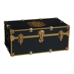 a black trunk with gold trimmings on the bottom and handles, sitting against a white background