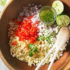 a bowl filled with rice, cilantro and other ingredients