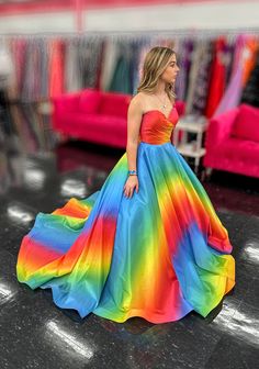 Be the center of attention in this eye-catching Johnathan Kayne 2202 Rainbow Dress. The strapless ombre formal gown features a stunning cut out back with bow details, making you stand out from the crowd. With a super full and unique skirt, this one-of-a-kind dress will make you feel truly special. Size: 4 Color: Rainbow Multicolor Evening Gown With Fitted Bodice, Multicolor Gown With Fitted Bodice For Evening, Strapless Ball Gown For Prom Season Homecoming, Multicolor Floor-length Gown With Fitted Bodice, Multicolor Fitted Gown For Gala, Multicolor Fitted Gala Gown, Fitted Multicolor Gown For Gala, Fitted Multicolor Gala Gown, Strapless Multicolor Dress For Gala