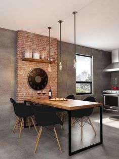 a table with chairs and a clock mounted to the wall above it in a kitchen