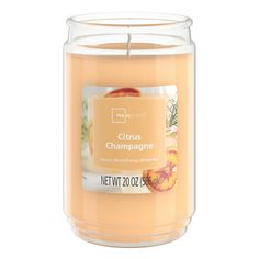 Introduce a soothing aroma into your living space with the Mainstays Citrus Champagne Scented 3-Wick Glass Jar Candle. Place this candle in the kitchen, living room or dining room where you can enjoy it when entertaining guests or anytime you want to relax. Mainstays offers a wide selection of candle scents to explore and enjoy. Shop all of our Mainstays scents online and in-store. Size: 20 oz.  Color: Orange. Citrus Candle, Candle Scents, Wishlist 2024, Glass Jar Candles, Citrus Scent, Jar Candle, Kitchen Living Room, Entertaining Guests, Christmas Wishlist